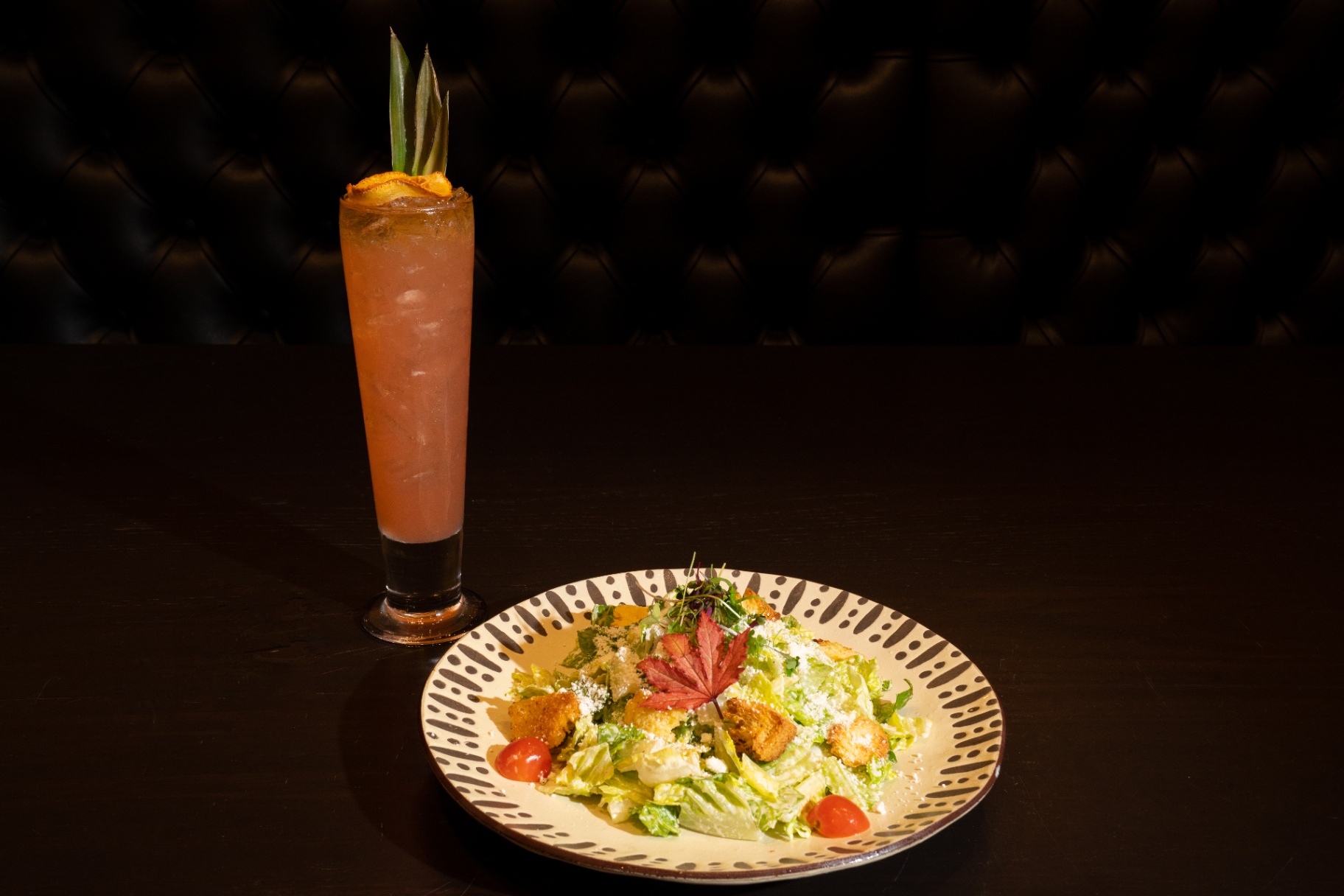 Handcrafted tropical cocktail with pineapple garnish